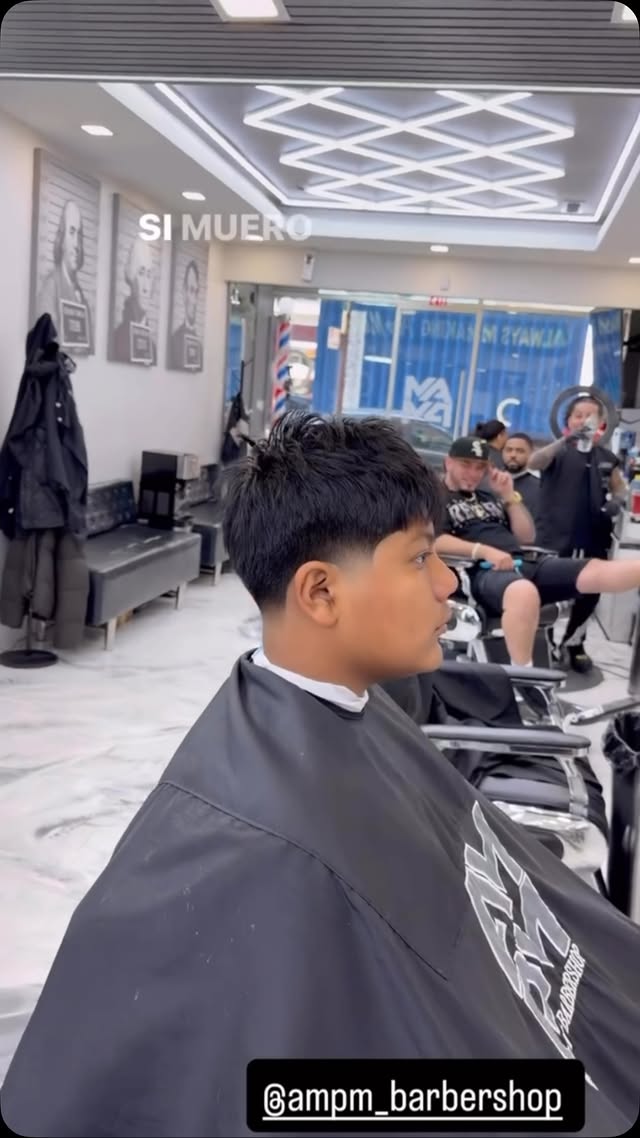 Inside Ampm Barbershop, Woodhaven Queens โ modern interior with geometric LED ceiling